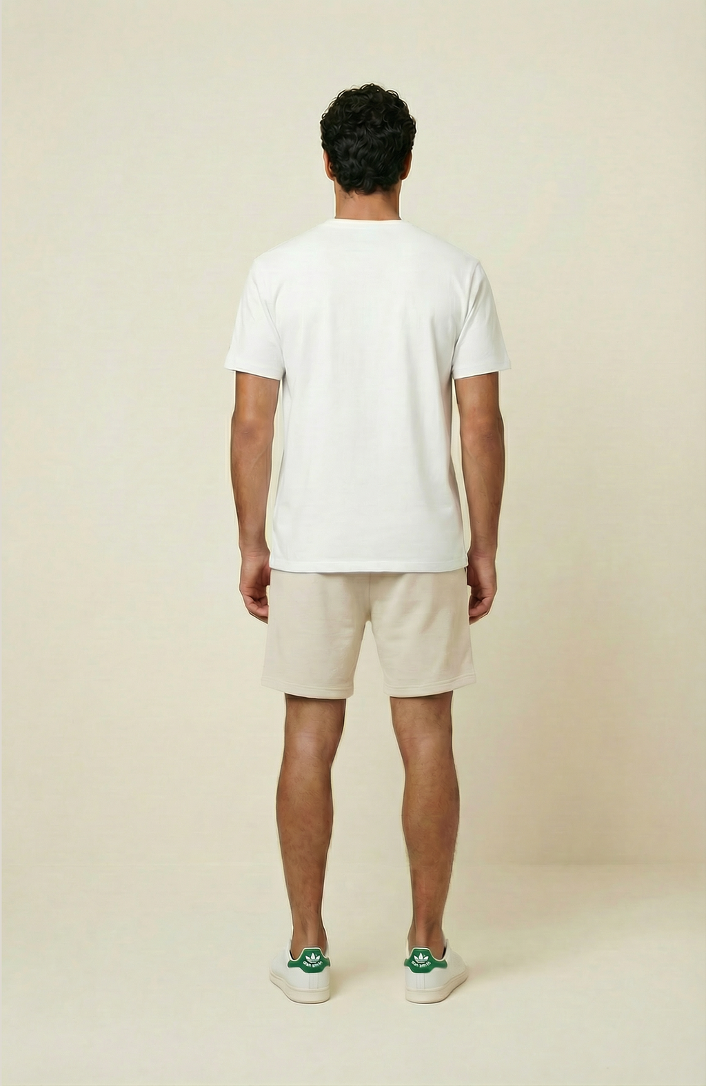 About Us Signature Logo Loose Fit T-Shirt — Black colourway, 180gsm midweight cotton