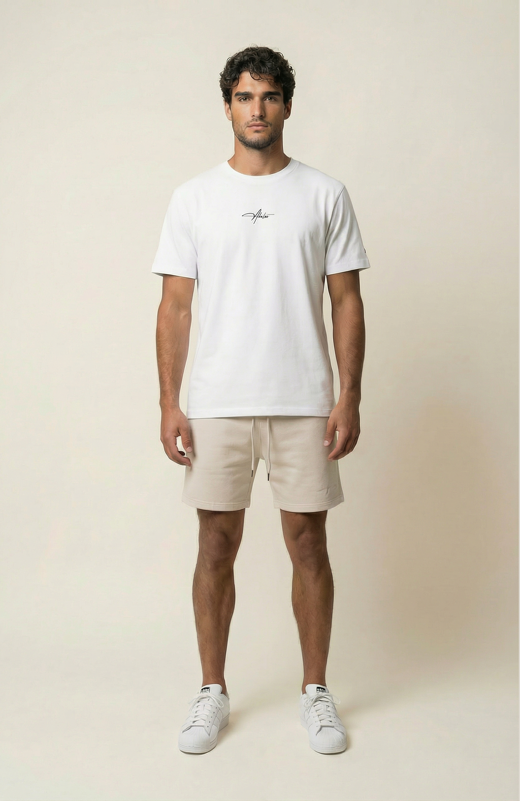 About Us Signature Logo Loose Fit T-Shirt — 180gsm 100% cotton, White, front view