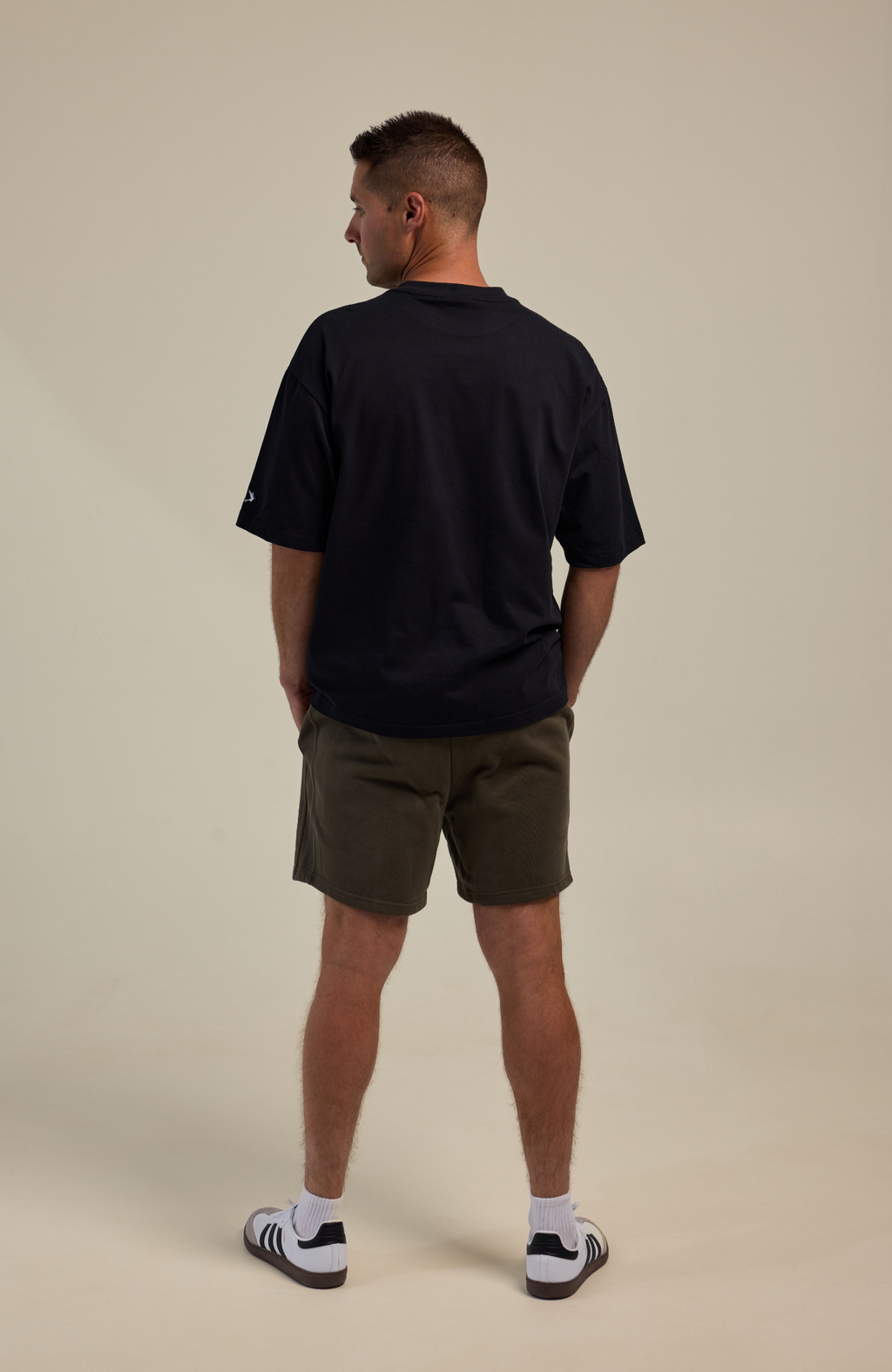 About Us Oversized Logo T-Shirt — side view, 260gsm streetwear tee