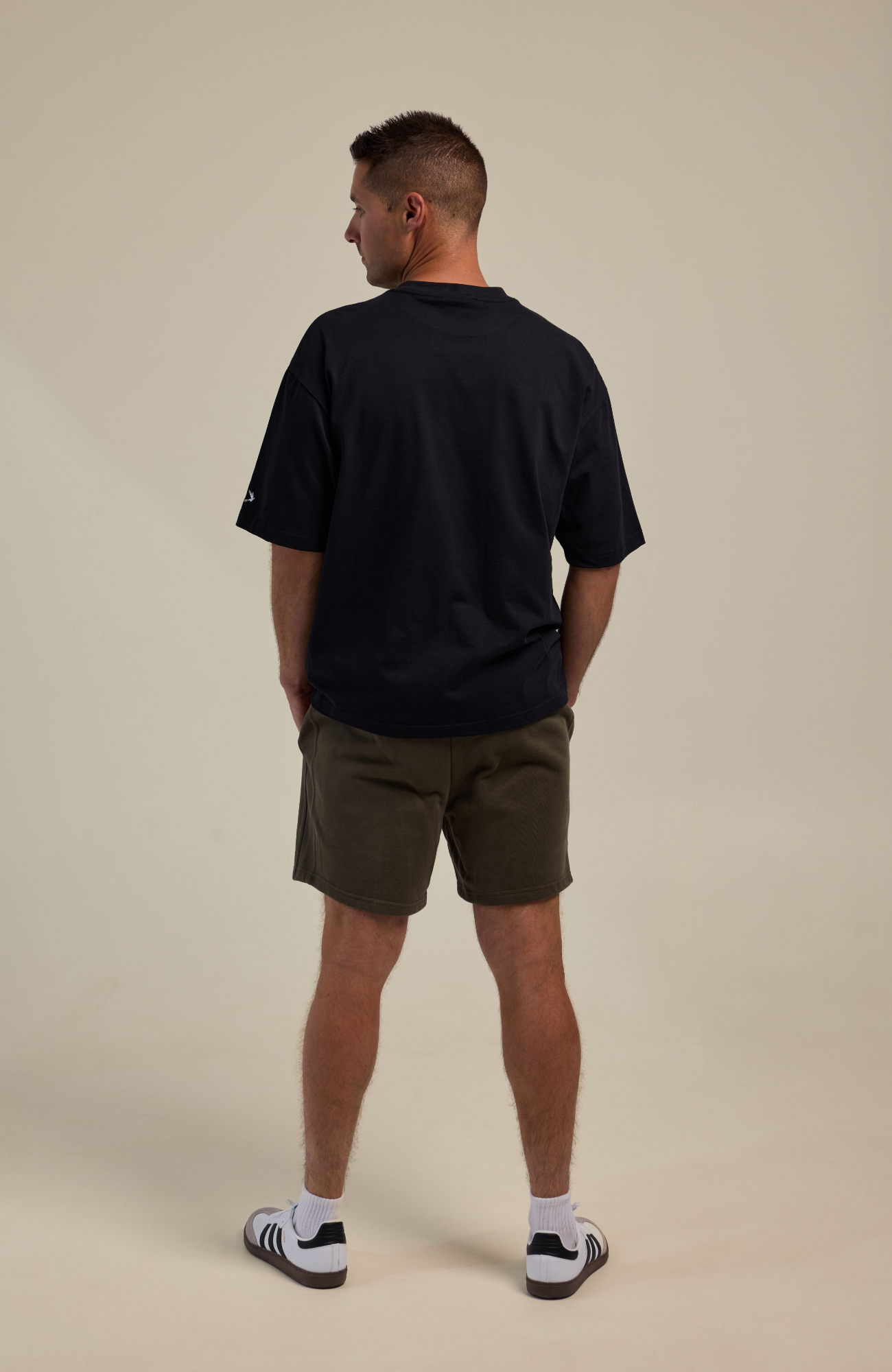About Us Oversized Logo T-Shirt — side view, 260gsm streetwear tee