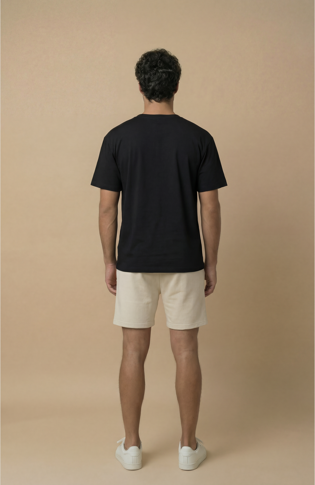 About Us Signature Logo Loose Fit T-Shirt — side view, everyday loose fit tee