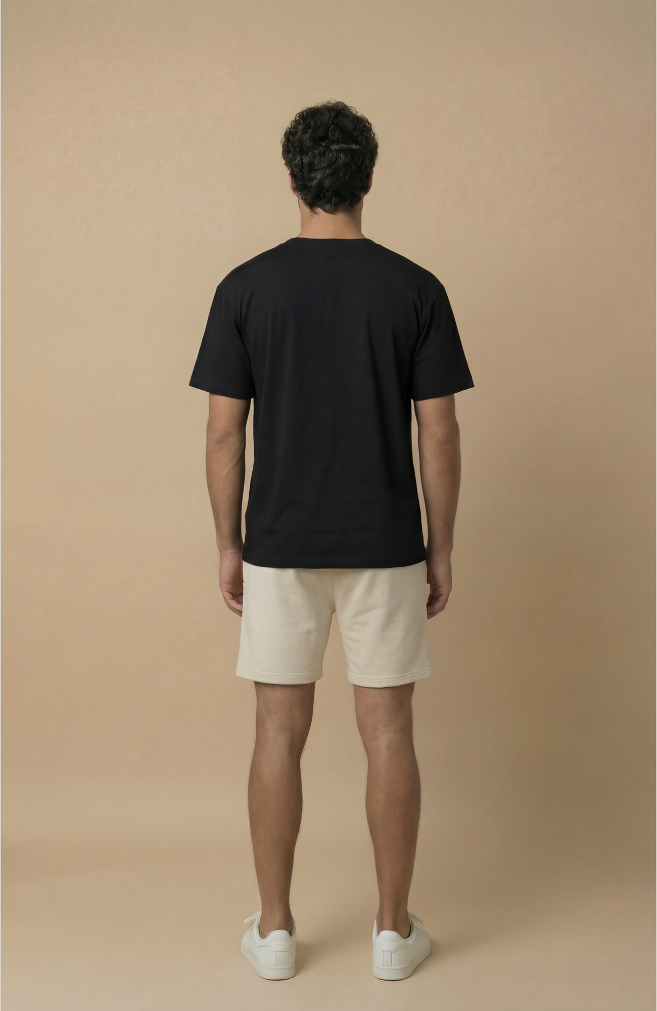 About Us Signature Logo Loose Fit T-Shirt — side view, everyday loose fit tee