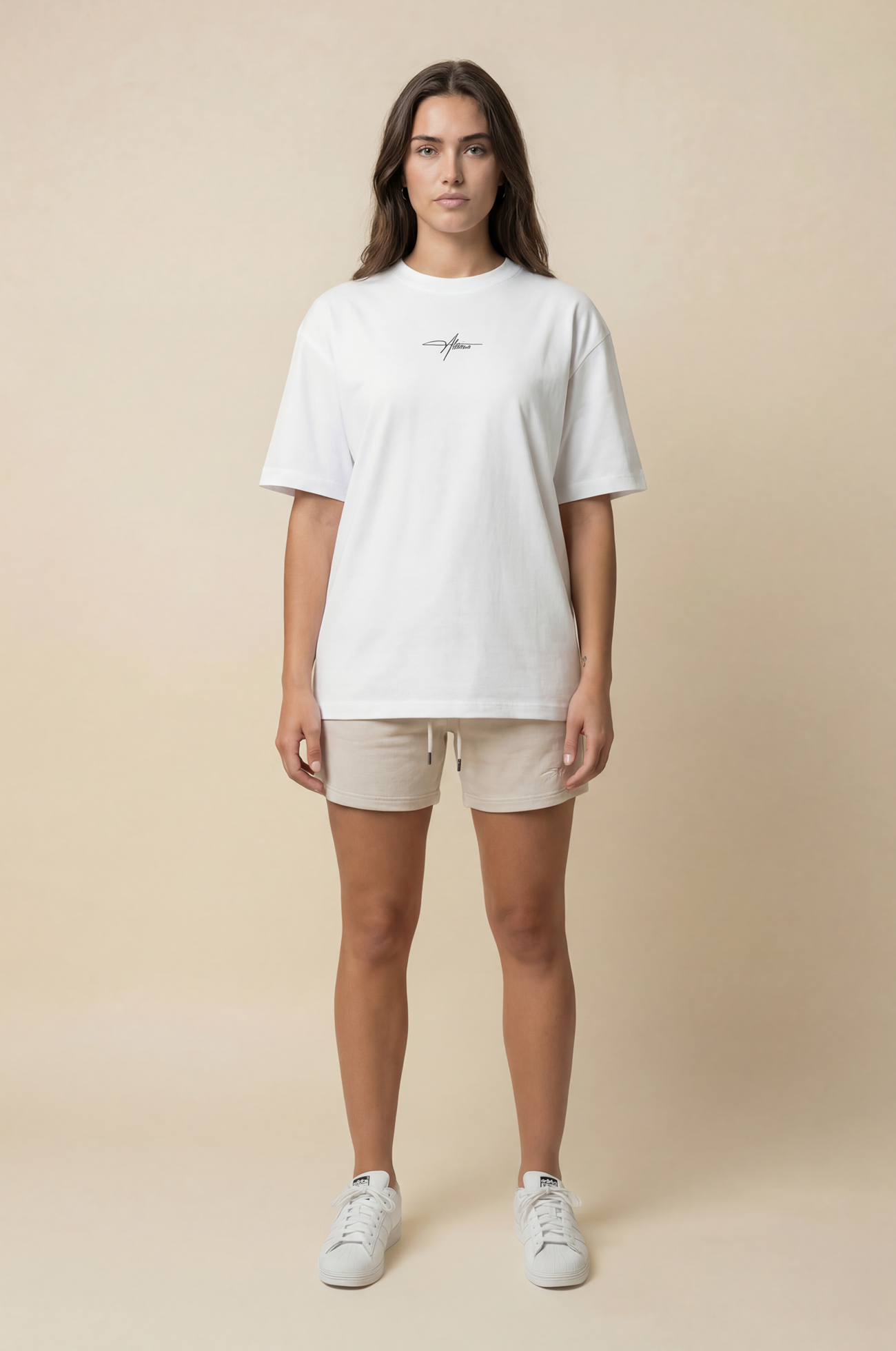 About Us Signature Logo Loose Fit T-Shirt — full length front, White