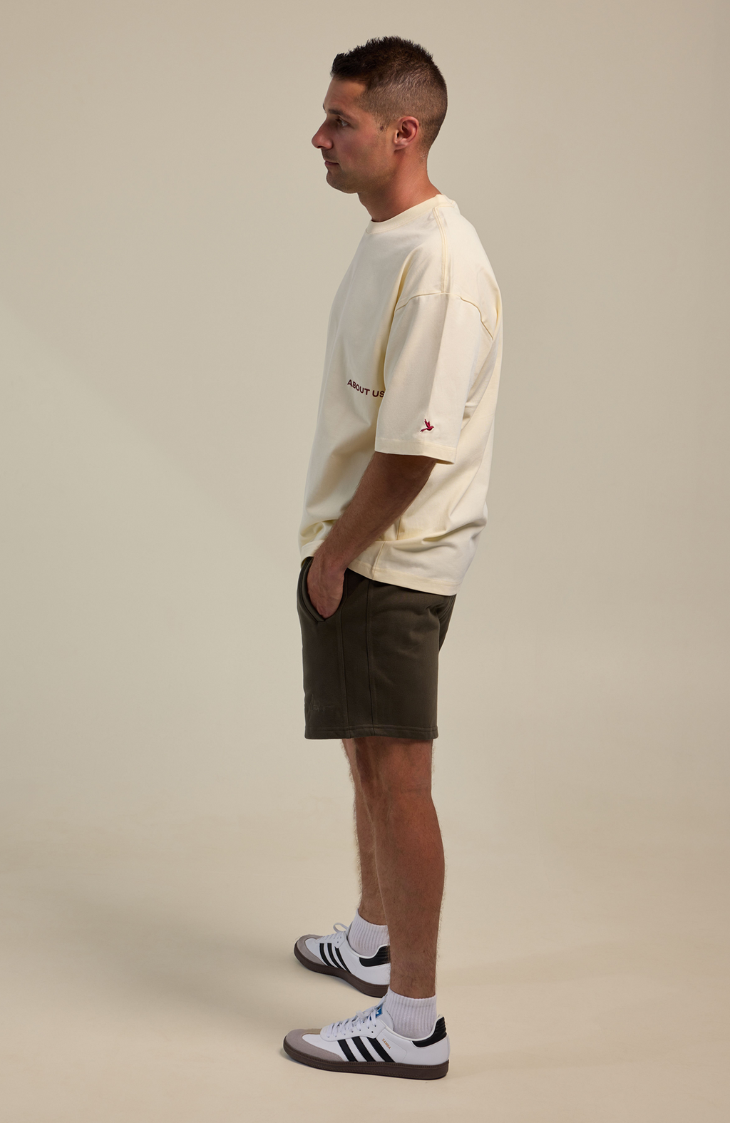 About Us Not Just A Label Oversized T-Shirt — back view, 260gsm structured drape