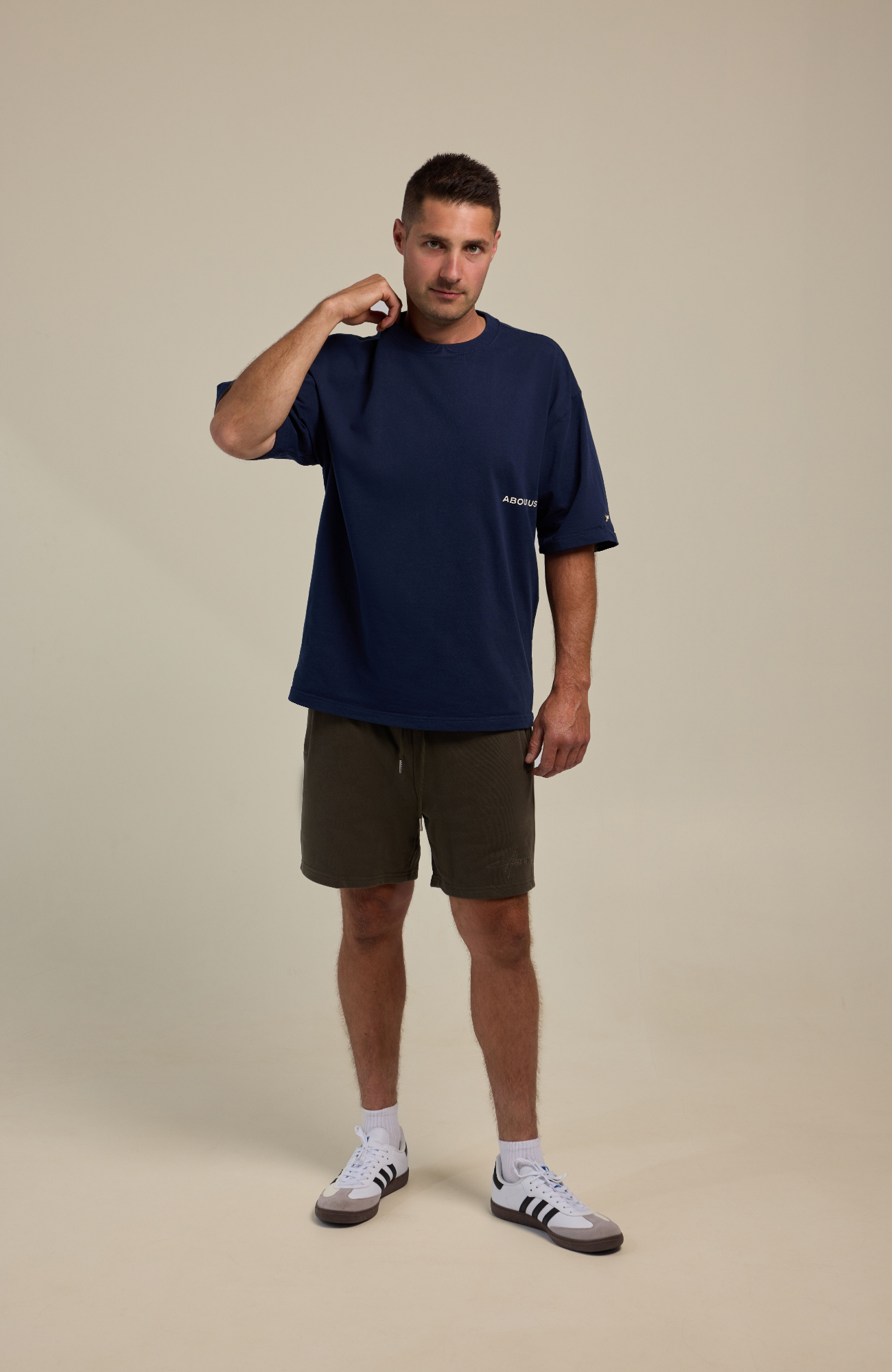About Us The Next Chapter Oversized T-Shirt — side view, structured cotton drape
