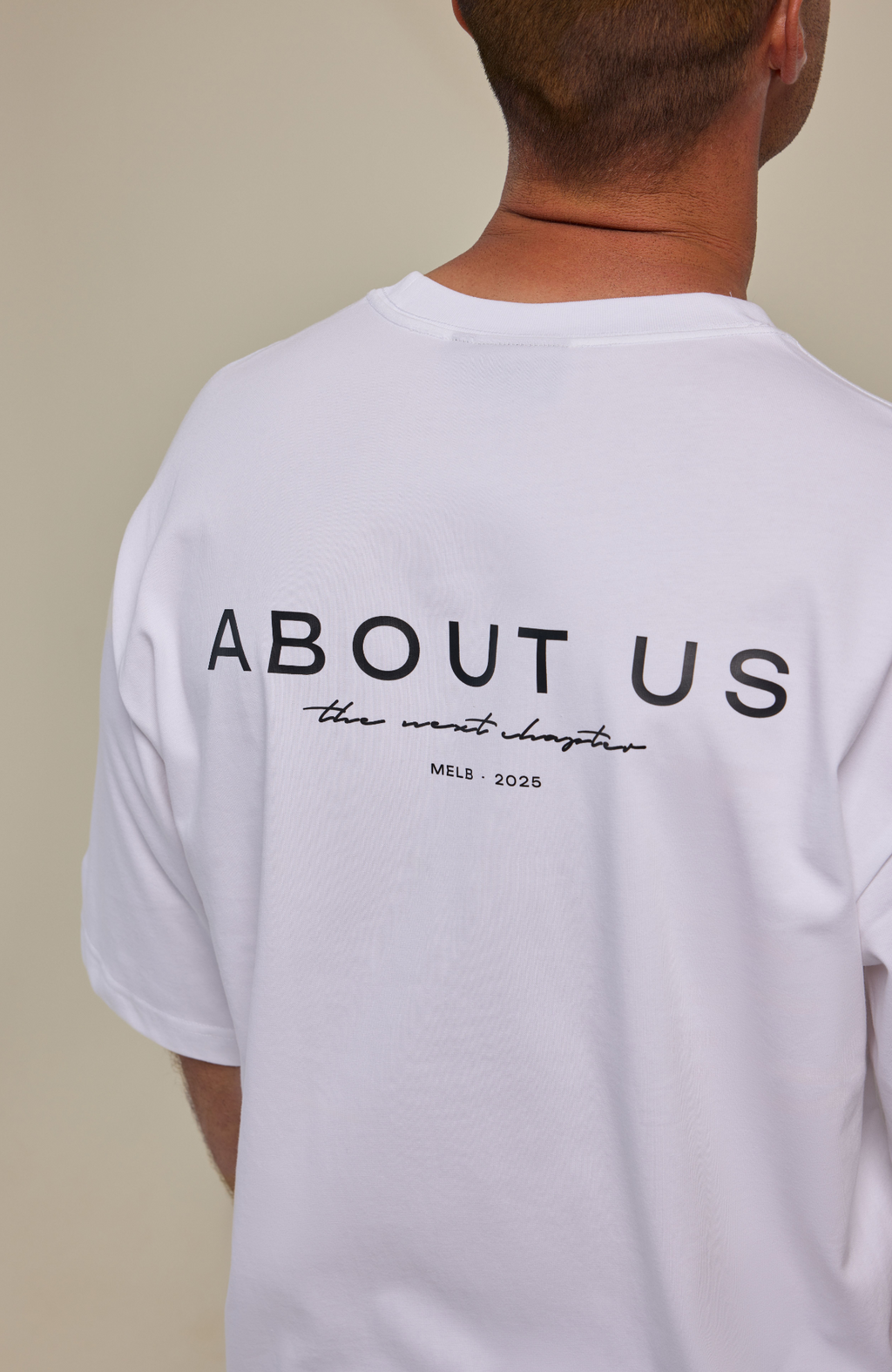 About Us The Next Chapter Oversized T-Shirt — lifestyle editorial shot