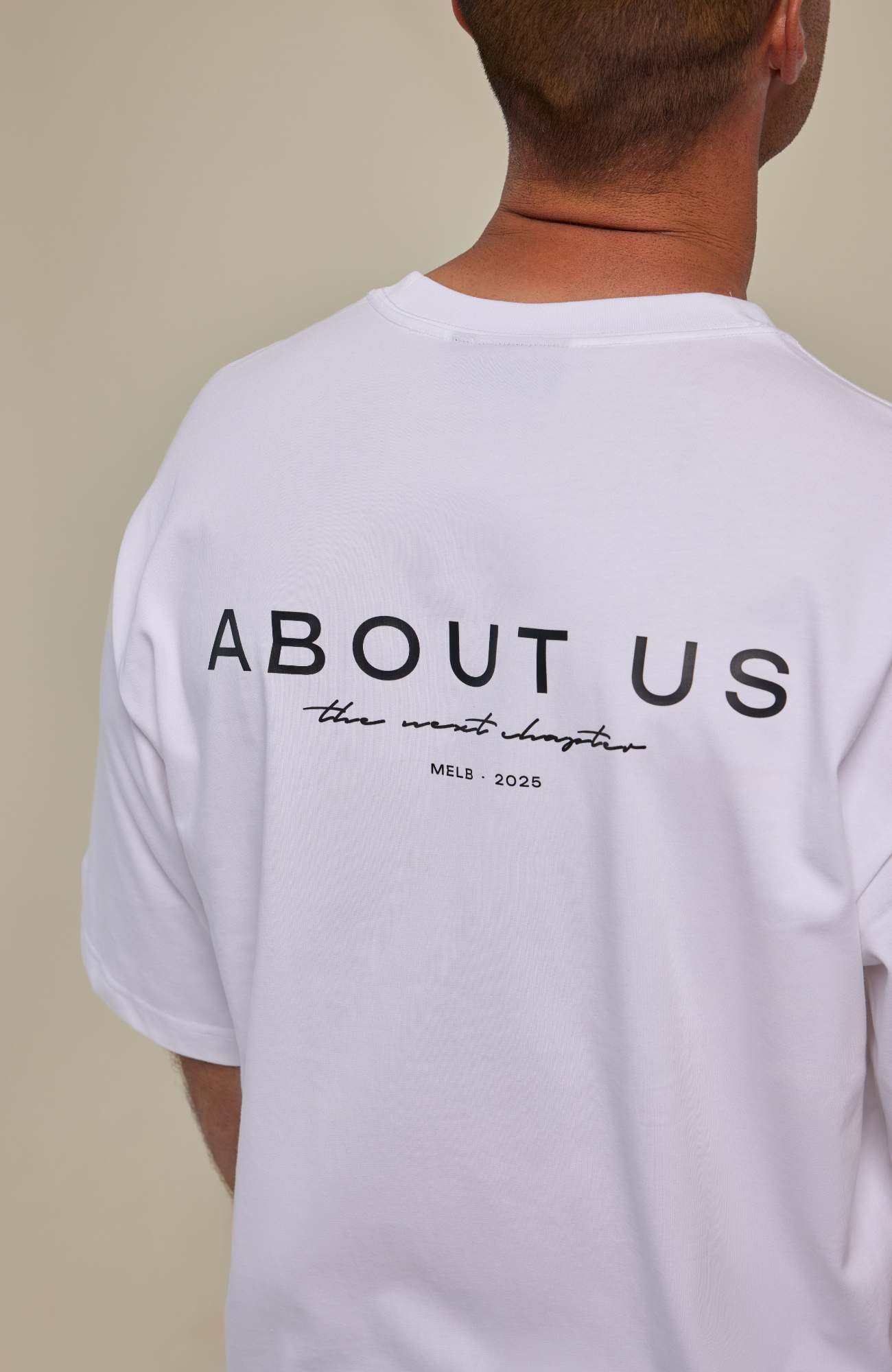 About Us The Next Chapter Oversized T-Shirt — lifestyle editorial shot