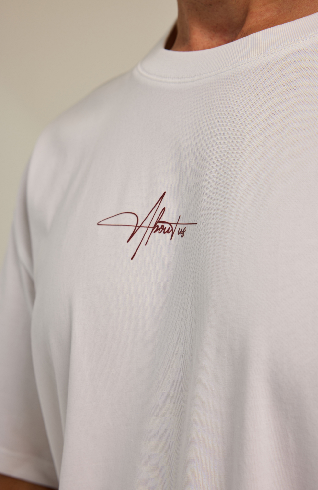 About Us Essential Training T-Shirt — side view, 180gsm midweight cotton