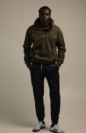 About Us Elements Hoodie in Forest Green — 100% cotton 460gsm Ultron fleece, front view