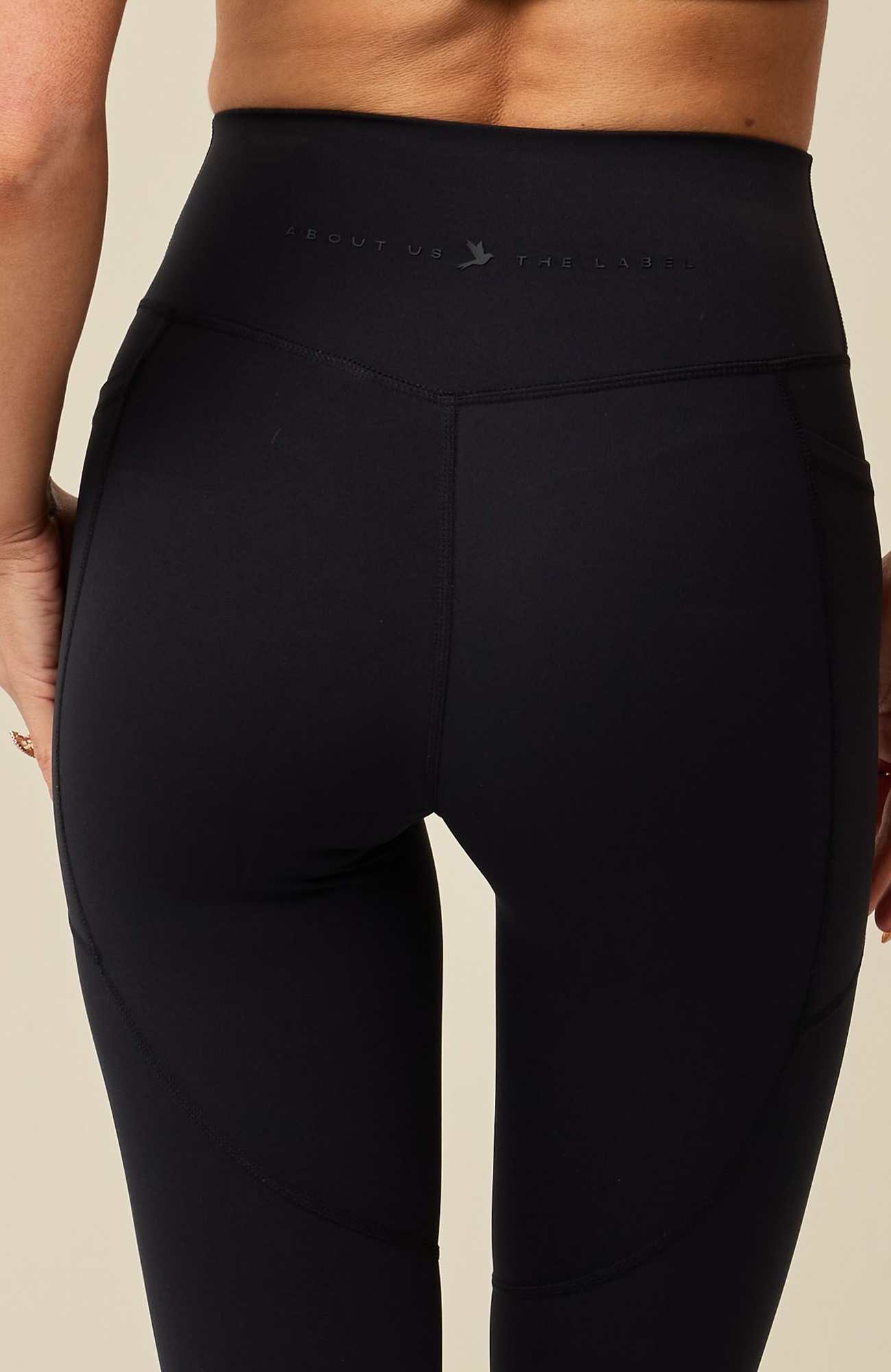 About Us Aura black sports leggings, back pocket detail