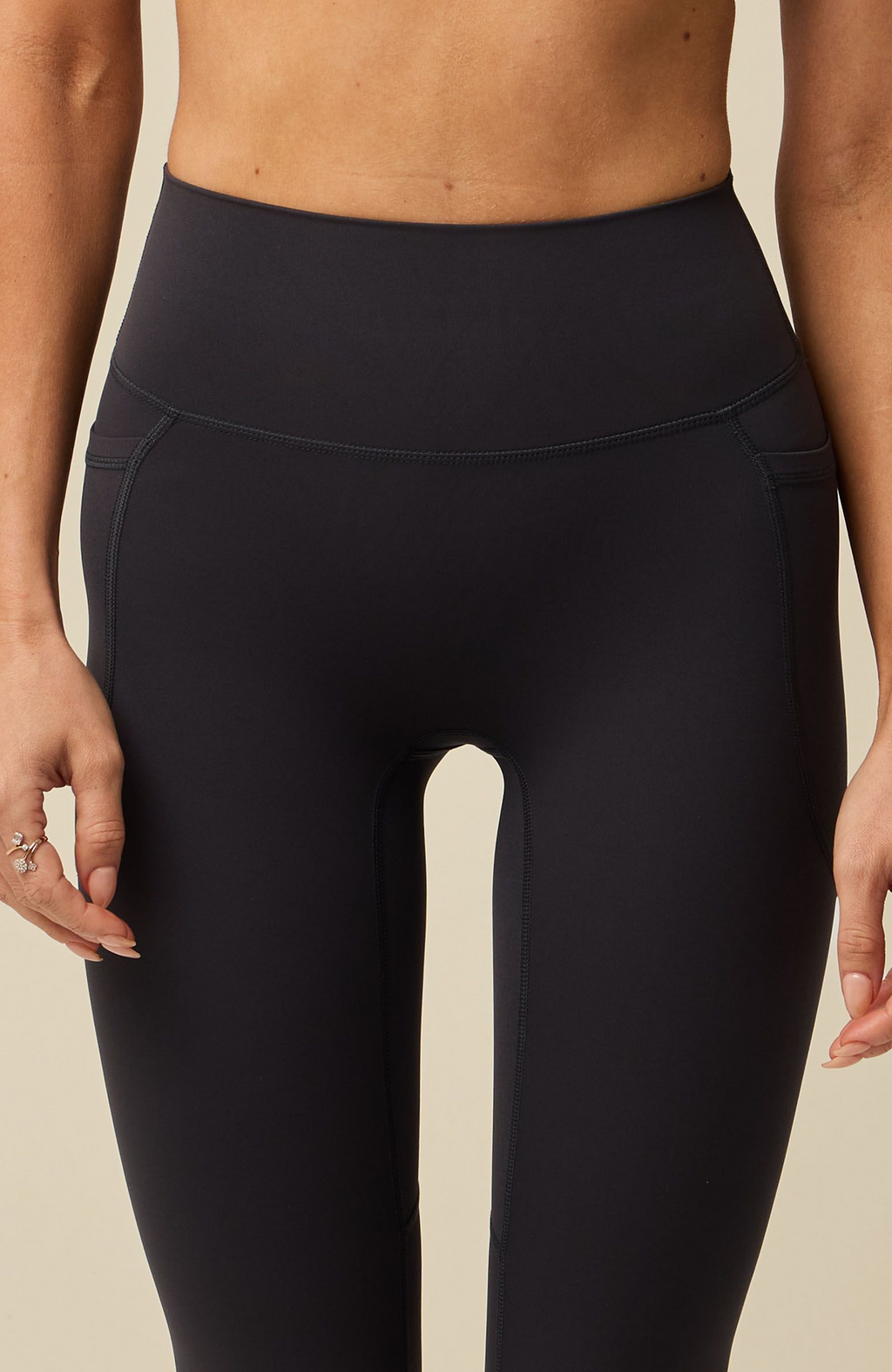 About Us Aura black sports leggings, front detail