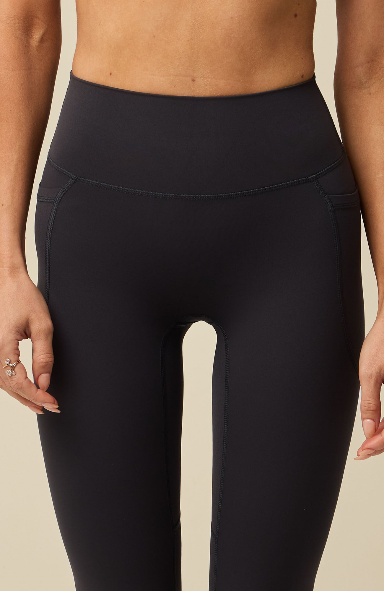 About Us Aura black sports leggings, front detail