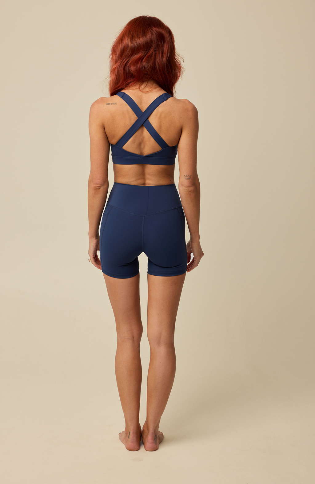 About Us Aura navy active shorts, back view