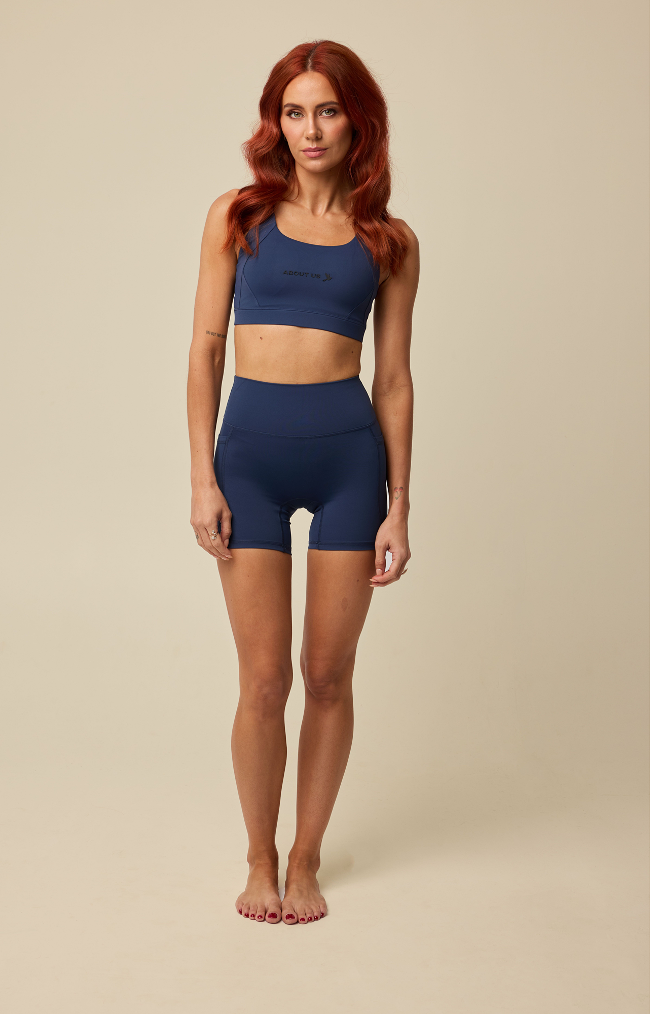 About Us Aura navy active shorts, front view
