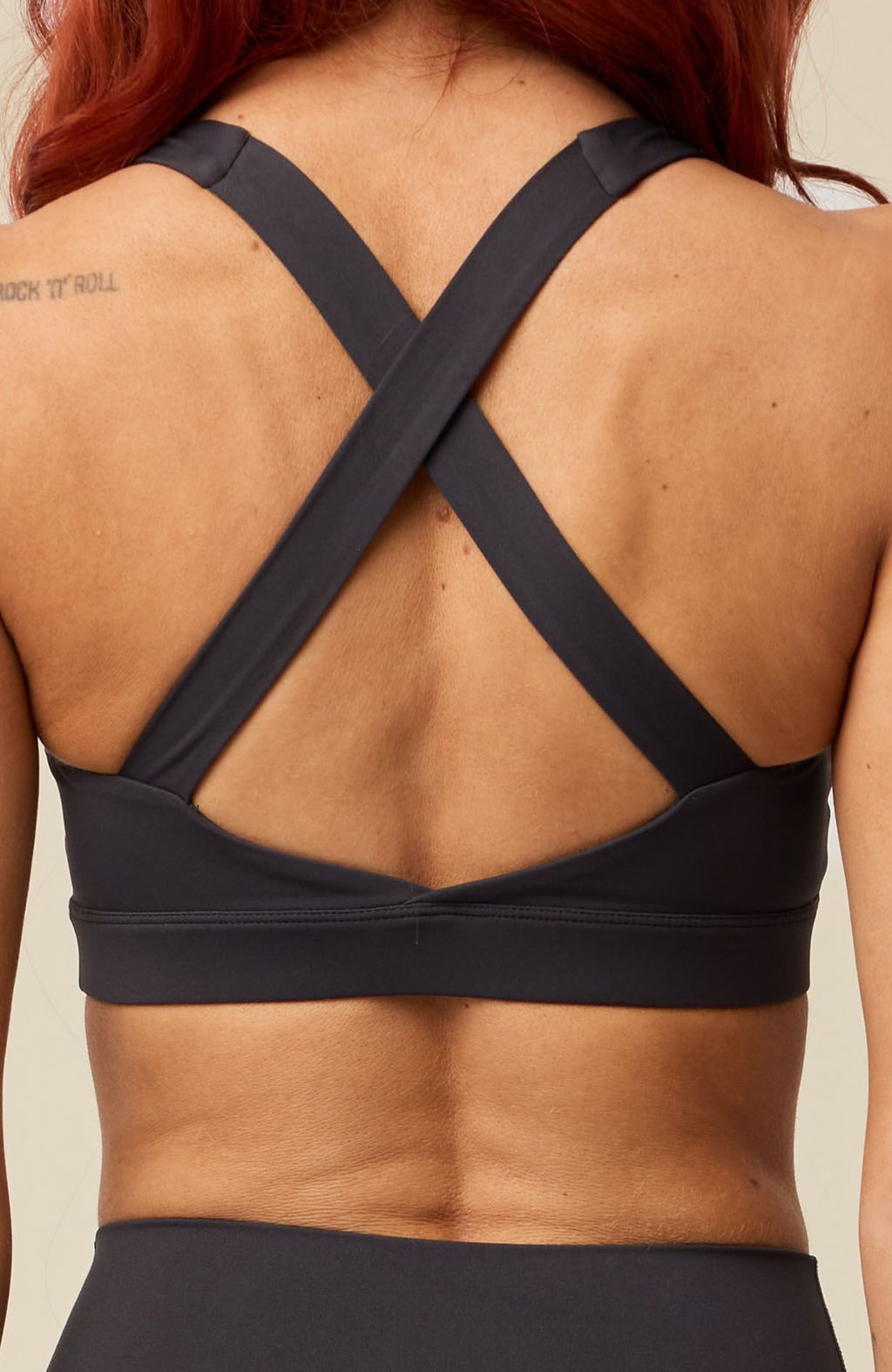 About Us Aura gray sports bra, back detail