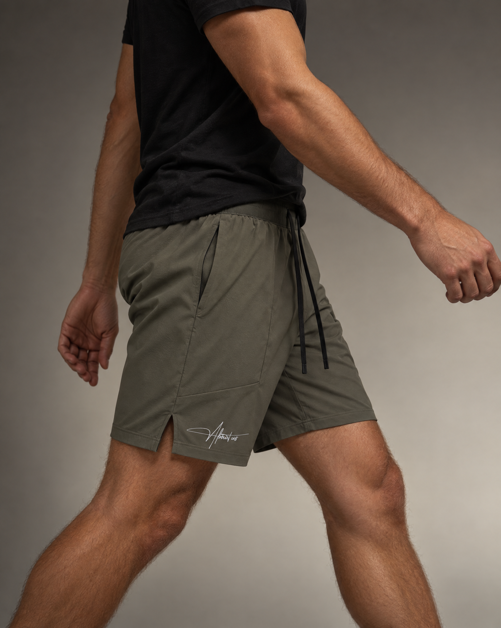 Halo Active Shorts in Green, worn mid-stride